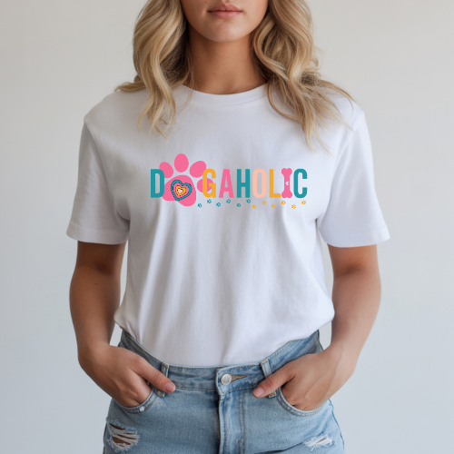 Woman wearing a white t-shirt with 'DOGAHOLIC' text, standing against a plain background