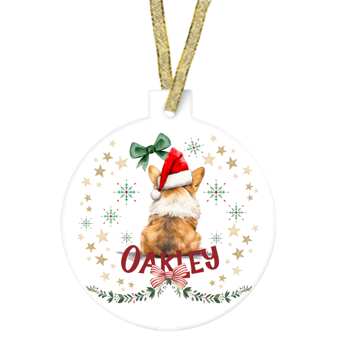 Christmas ornament with a dog wearing a Santa hat and the name 'Oakley'.