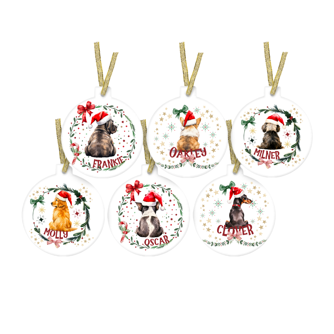 Set of six Christmas ornaments with dogs wearing Santa hats on a white background